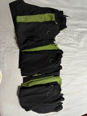 Three pairs of Grey's Anatomy Black Scrubs with Moss Green Accent